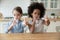 Portrait of smiling multiethnic girls drink water