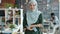 Portrait of smiling muslim businesswoman wearing head scarf standing in creative office