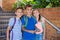 Portrait of smiling school kids standing on school staircase