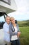 Portrait of smiling senior couple in countryside