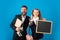 Portrait of smiling teacher and happy pupil schoolgirl ready to school. Portrait of dad and little girls with school