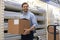 Portrait of a smiling warehouse keeper at work