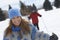 Portrait Of Smiling Woman Cross Country Skiing