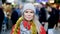 Portrait of smiling woman shopping on festive fair before Christmas