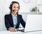 Portrait of smiling woman working in call center