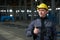 Portrait of a smiling worker in a factory