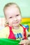 Portrait of smiling young blond preschool girl