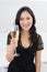 Portrait of a smiling young woman with champagne