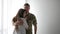 Portrait soldier man, in camouflage uniform, romantic reunion at