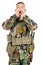 Portrait soldier or private military contractor shouting with hands cupped.