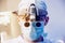 Portrait of spinal surgeon in operating room with surgery equipment.