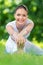 Portrait of sportswoman stretching in park