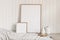 Portrait and square empty wooden frame mockups with linen cloth and modern ceramic vases. White beadboard wainscot wall