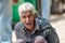 Portrait of Sri Lankan old poor musician on the street