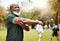 Portrait, stretching and active seniors at a park for training, exercise and cardio wellness. Fitness, arm stretch and