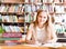 Portrait of a student girl studying at library