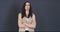 Portrait, studio and business woman with arms crossed against a gray background mock up. Leadership, young female