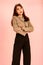 Portrait studio shot of Asian young urban trendy female hipster teenager fashion model in casual crop top street wears jacket