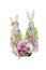 Portrait of stuffed Rabbit couple standing together with flower bouquet over white background