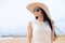 Portrait of stunningly beautiful young woman in a white dress and sunglasses.