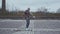 Portrait of stylish teenage young guy playing football outdoor. Sport, soccer and youth subculture.