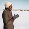 Portrait of stylish young african man listening music