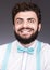 Portrait of stylish young man with a crazy smile. Curly dark hair