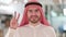 Portrait of Successful Arab Businessman showing Victory Sign with Hand