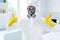 Portrait of successful worker cleaner man in glasses gloves show thumb up symbol approve decontamination covid-19 flu