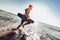 Portrait of surfer man with surf board on the beach.