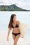 Portrait of surfer woman on Waikiki Beach Hawaii