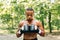 Portrait of a sweated male boxer with gloves