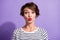 Portrait of sweet flirty short brunette hairdo girl blow kiss wear stripped pullover isolated on violet color background