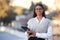 Portrait, tablet and a business woman in city during the day, ready for corporate success with mockup. Research