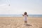 Portrait of a tanned girl on the sandy beach