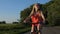 Portrait of teen girl on a bicycle in countryside