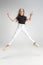 Portrait of teen school caucasian girl in casual clothes posing isolated over white studio background.