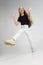 Portrait of teen school caucasian girl in casual clothes posing  over white studio background.