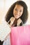 Portrait Of Teenage Girl Carrying Shopping Bags