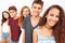 Portrait Of Teenage Group Leaning Against Wall