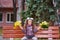 Portrait of a teenage schoolgirl girl with a bouquet of autumn leaves