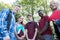 Portrait Of Teenage Students Outside School Building