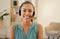Portrait, telemarketing and woman with headphones, call center and ecommerce with a smile, customer service and