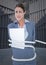 Portrait of tense businesswoman tied up with rope and paper