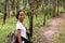 Portrait of Thai trekking lady smiling during path of trail