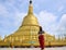 Portrait thai women praying at Shwemawdaw Paya Pagoda in Bago Myanmar