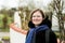 Portrait of a thirty year old beautiful woman with glasses at the Belgian countryside