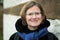 Portrait of a thirty year old beautiful woman with glasses at the Belgian countryside