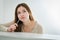 Portrait of a thoughtful adolescent girl at desk