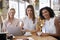 Portrait Of Three Businesswomen Meeting In Coffee Shop